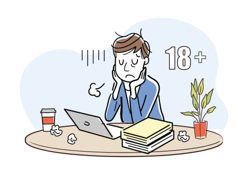 Een jongere die bezorgd op de laptop kijkt